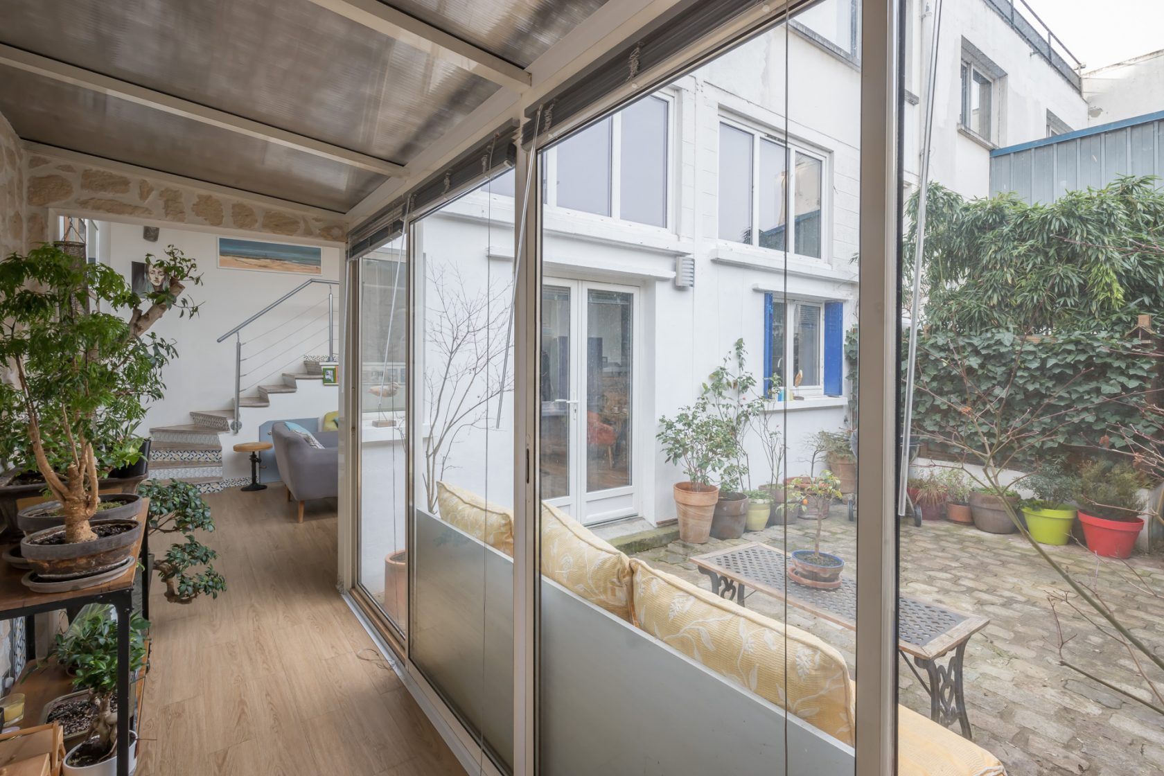 Loft house with paved courtyard