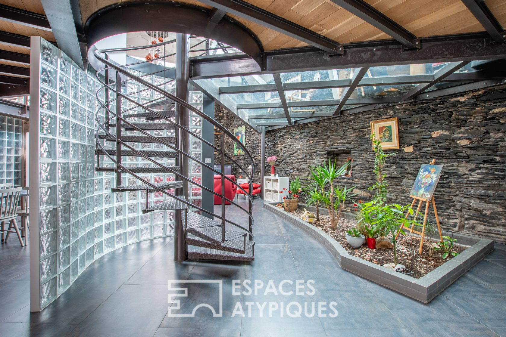 Appartement loft sous puits de lumière en hypercentre