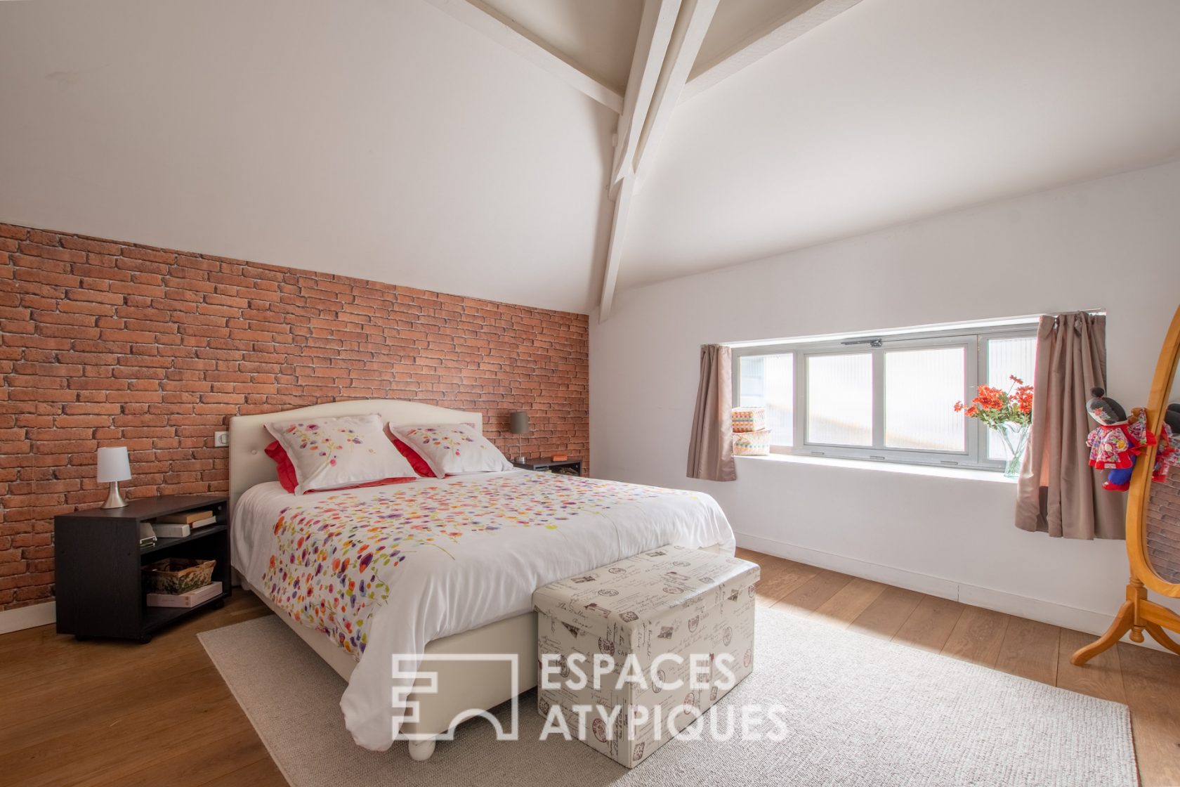 Appartement loft sous puits de lumière en hypercentre