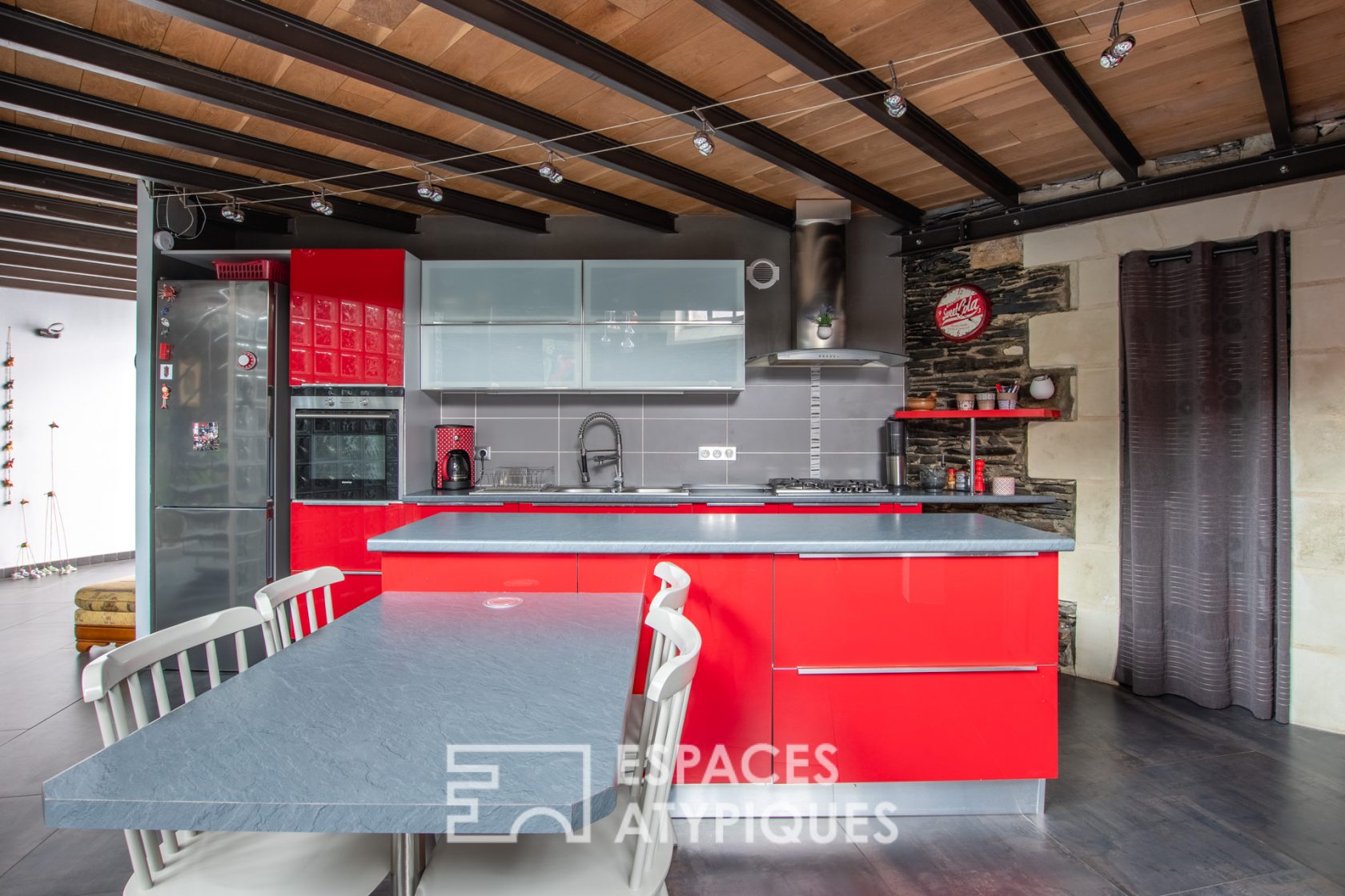 Appartement loft sous puits de lumière en hypercentre