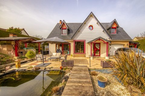 Maison restructurée avec son jardin paysager