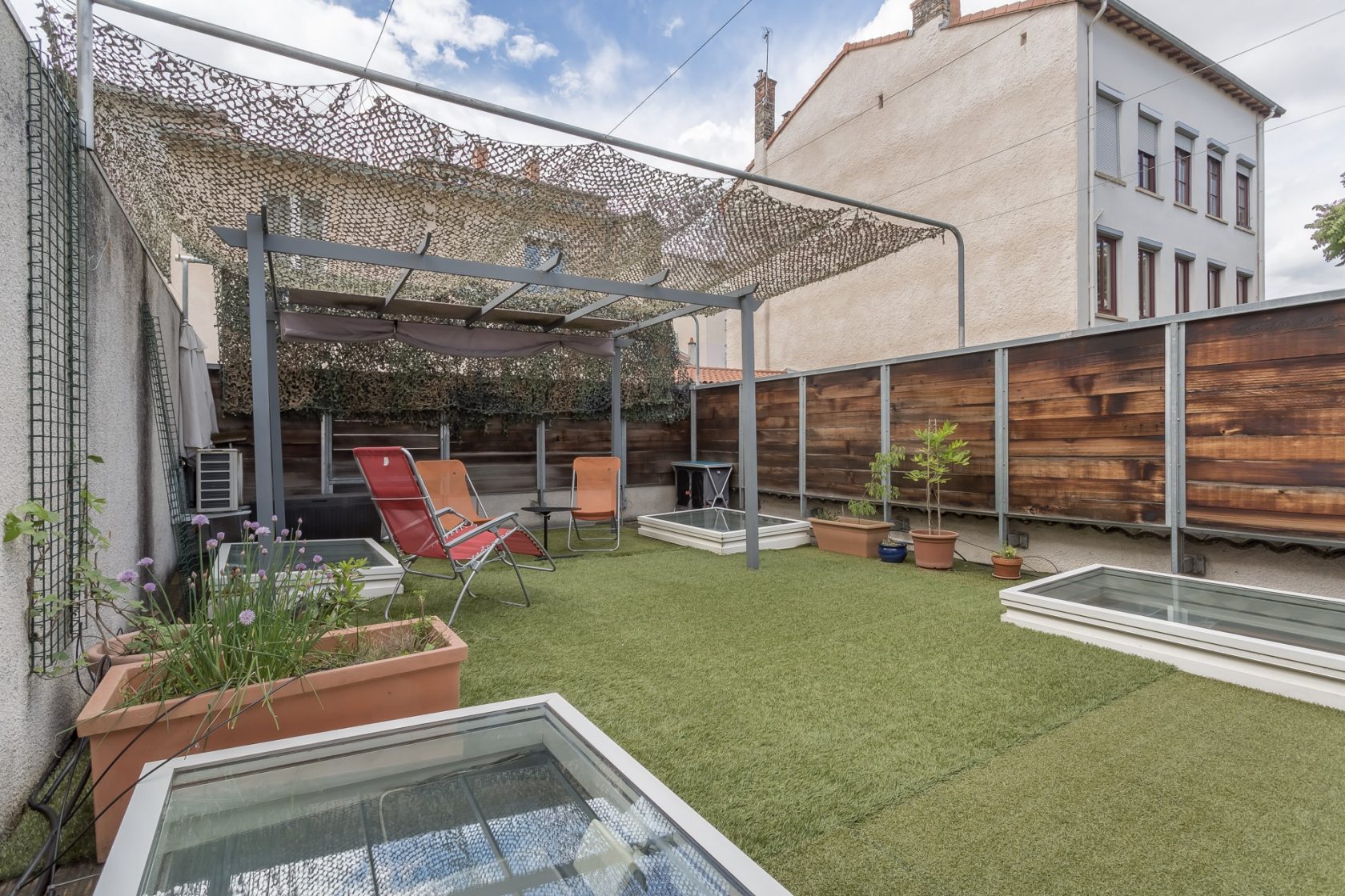 Loft avec terrasse et patio place Saint Louis