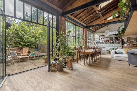 Loft in an old garage with terrace and garden