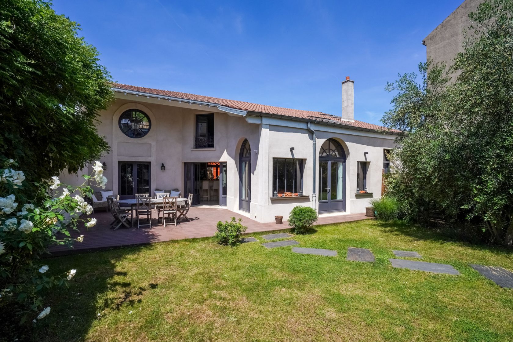 Former school revisited into a house with terrace and garden