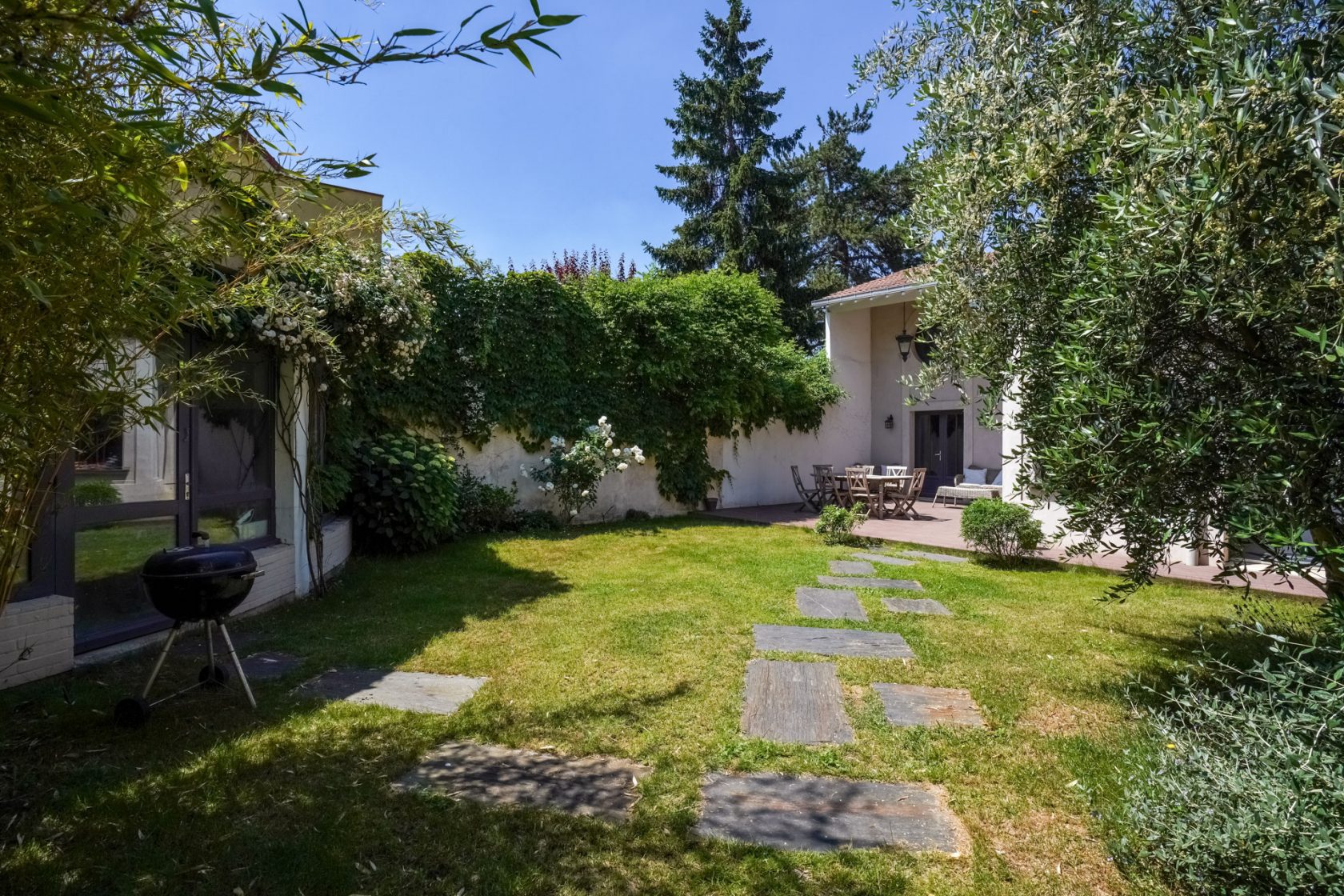 Former school revisited into a house with terrace and garden