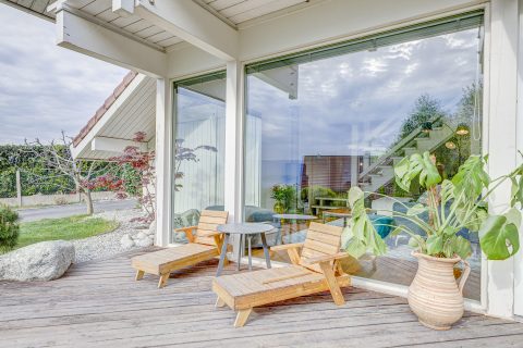 Contemporary wooden house with lake view