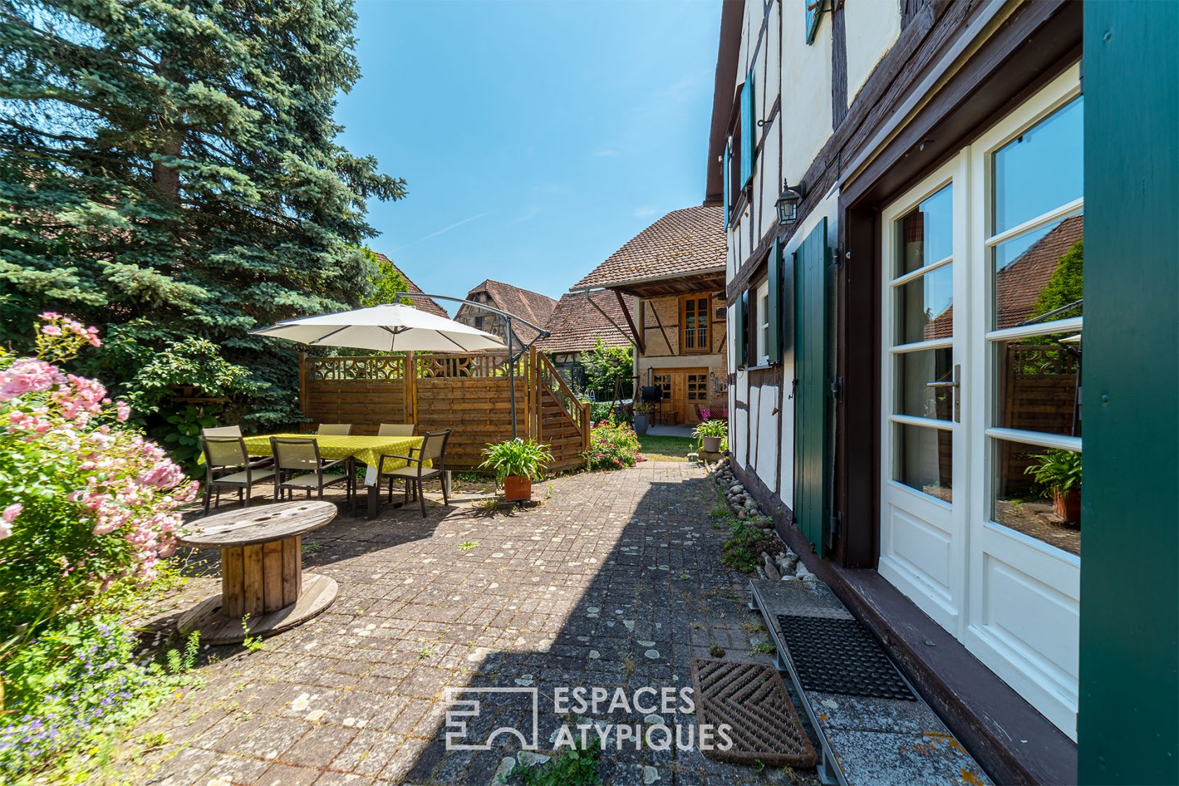 Renovated farmhouse and its guest rooms