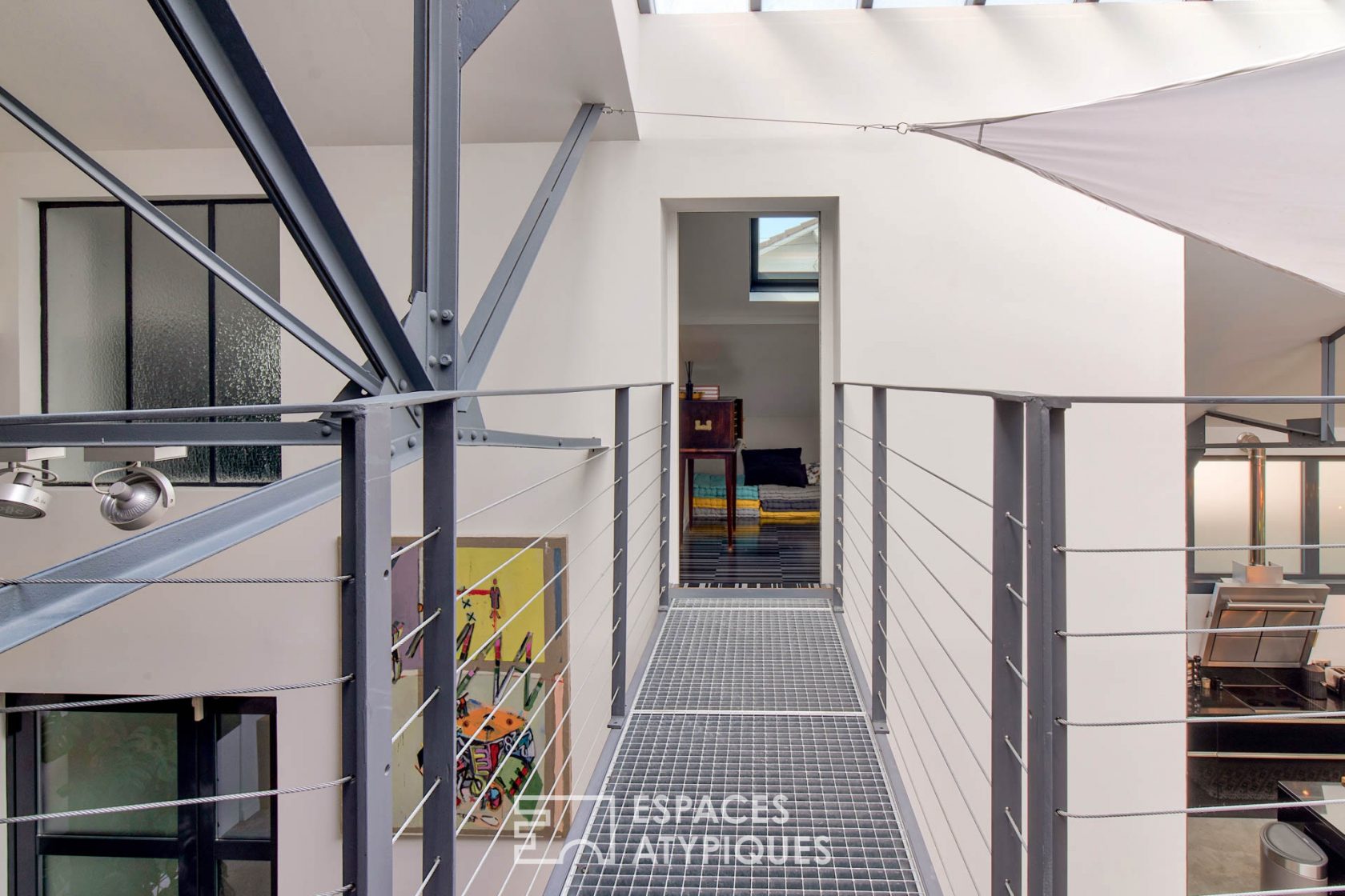 Atelier de ferronnerie d’art revisité en Loft d’exception