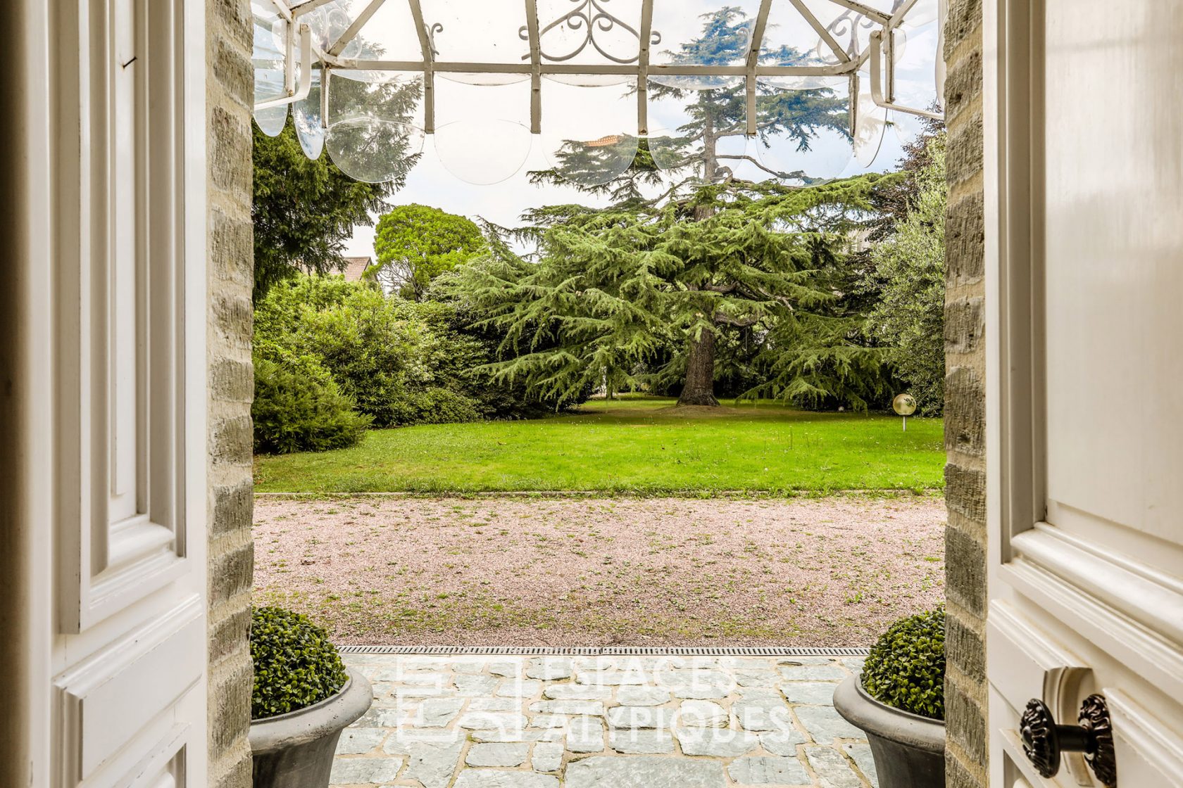 Renovated old farm and its tree-lined park