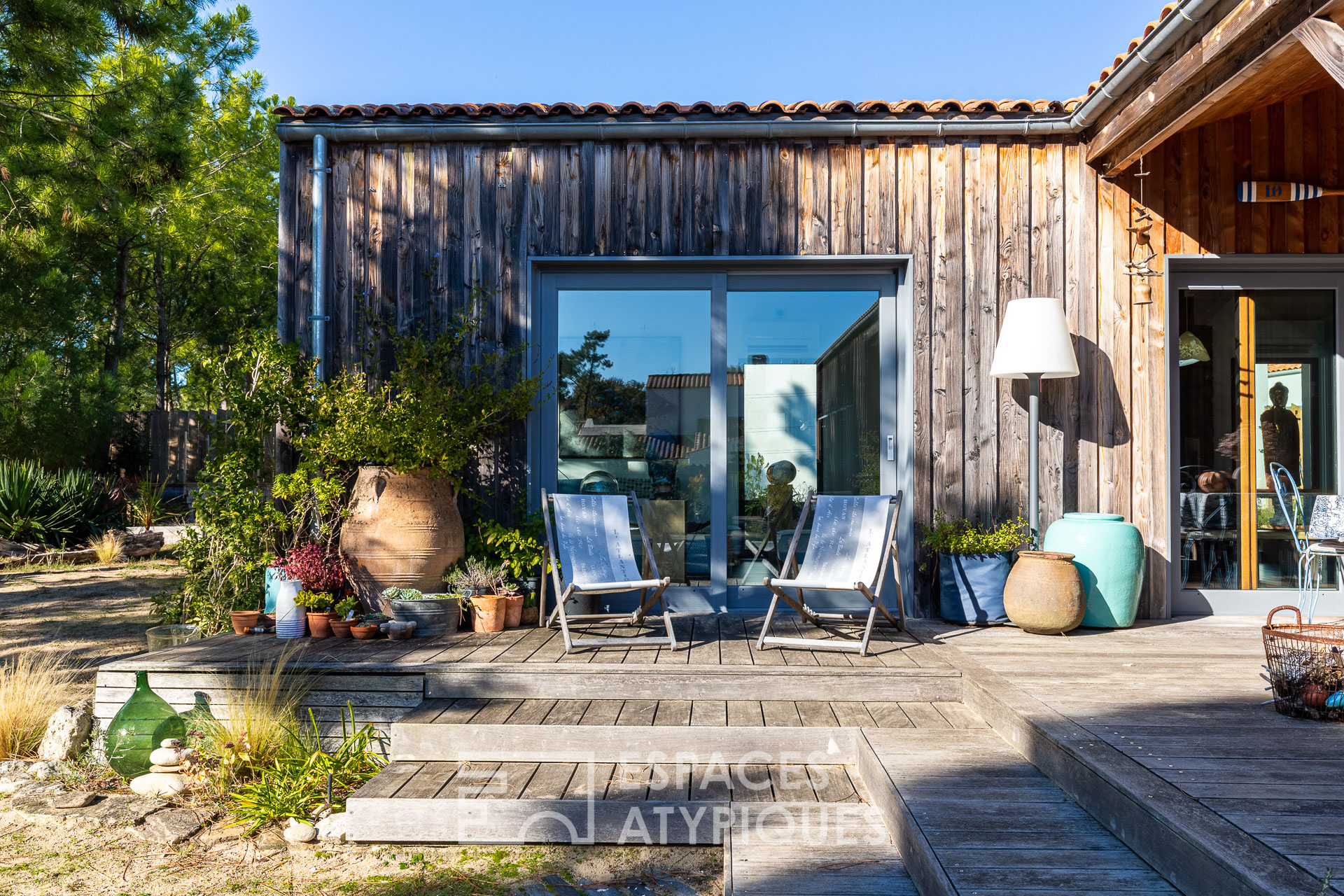 Maison de plage en ossature bois, les pieds dans le sable