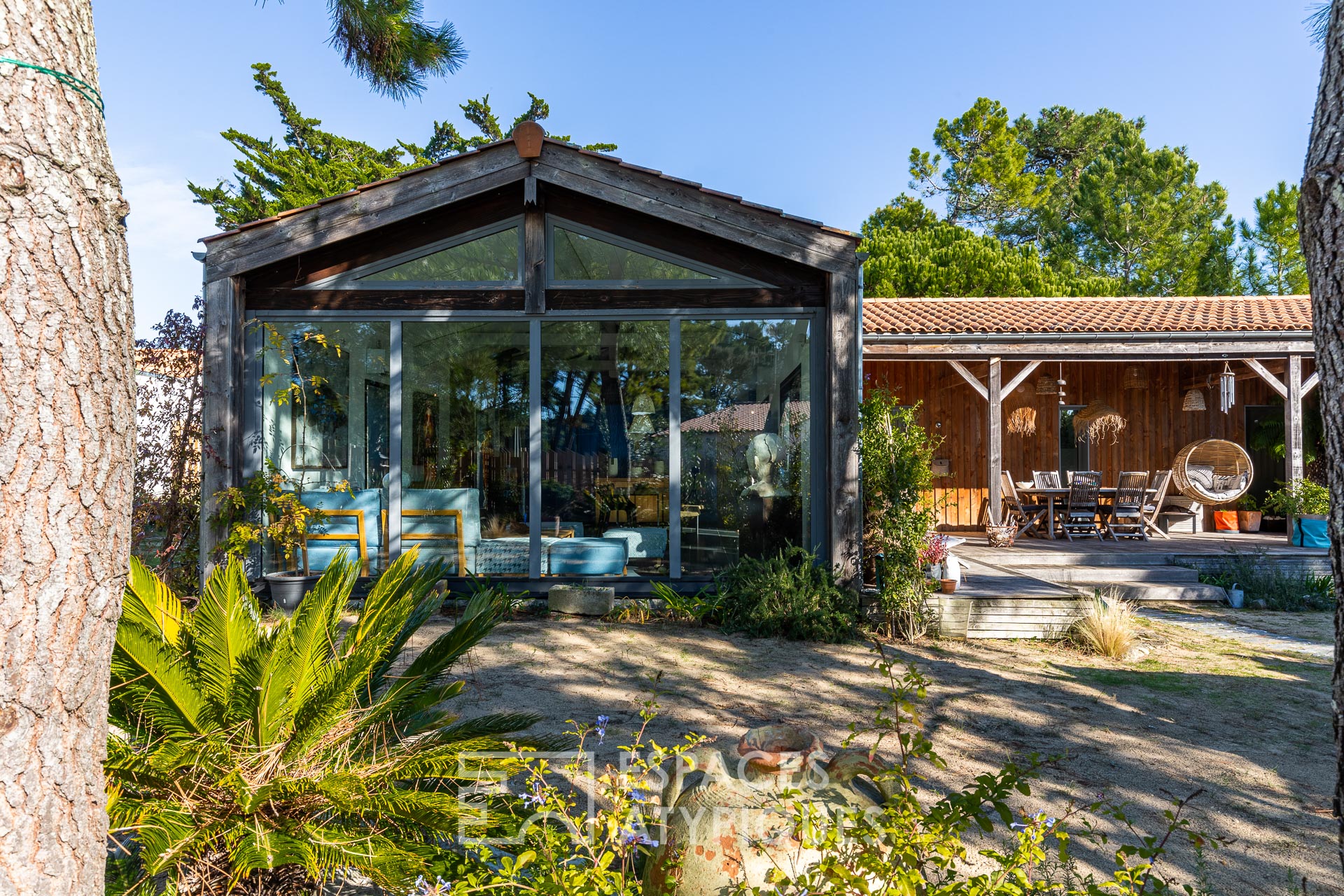 Maison de plage en ossature bois, les pieds dans le sable