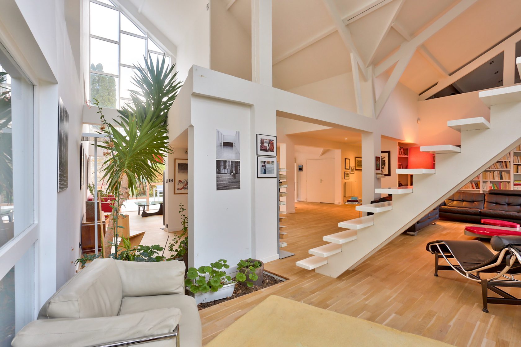 Fabulous architect-designed house with living room-cathedral in the middle of a park