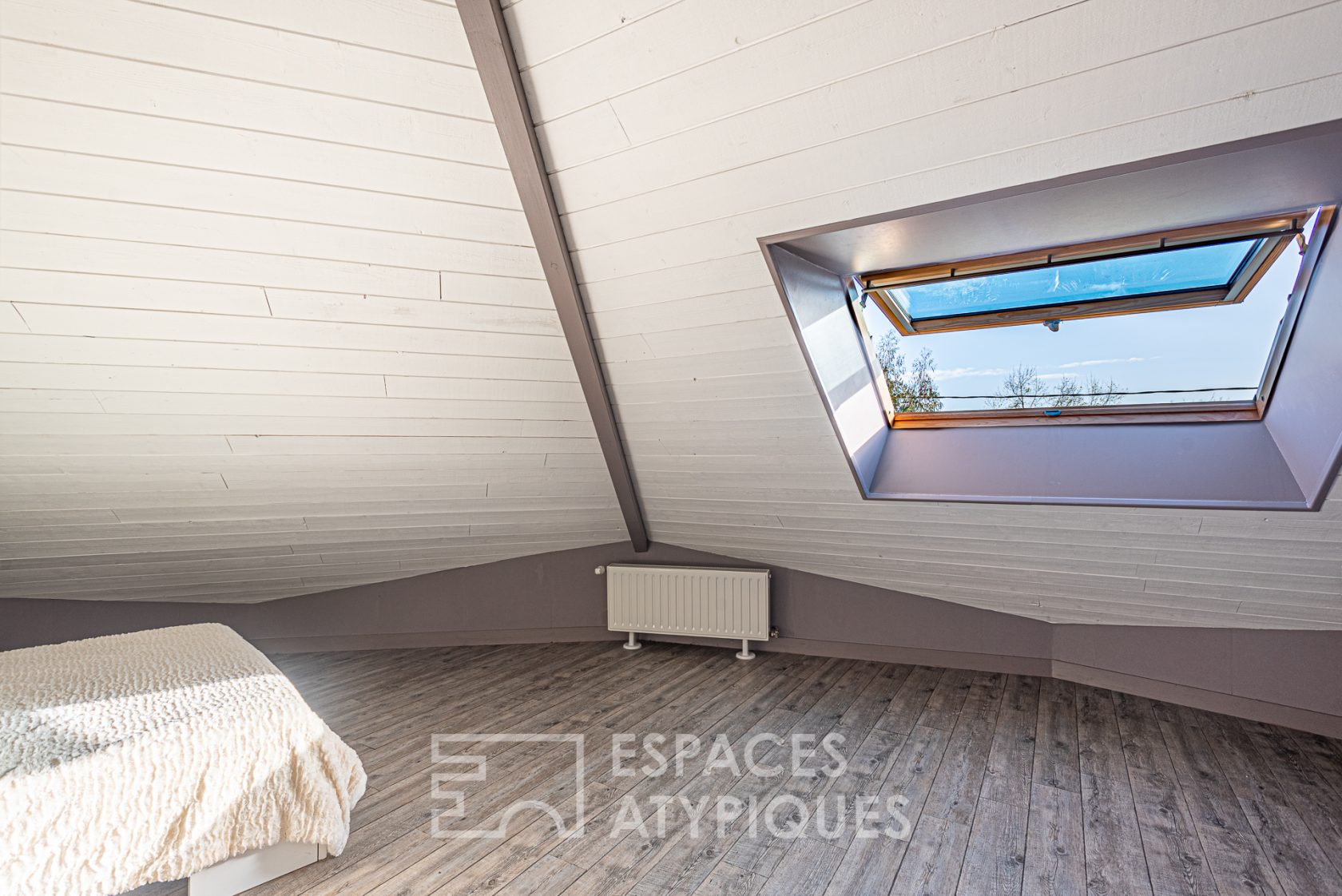 Maison tétra-décagonale en bois