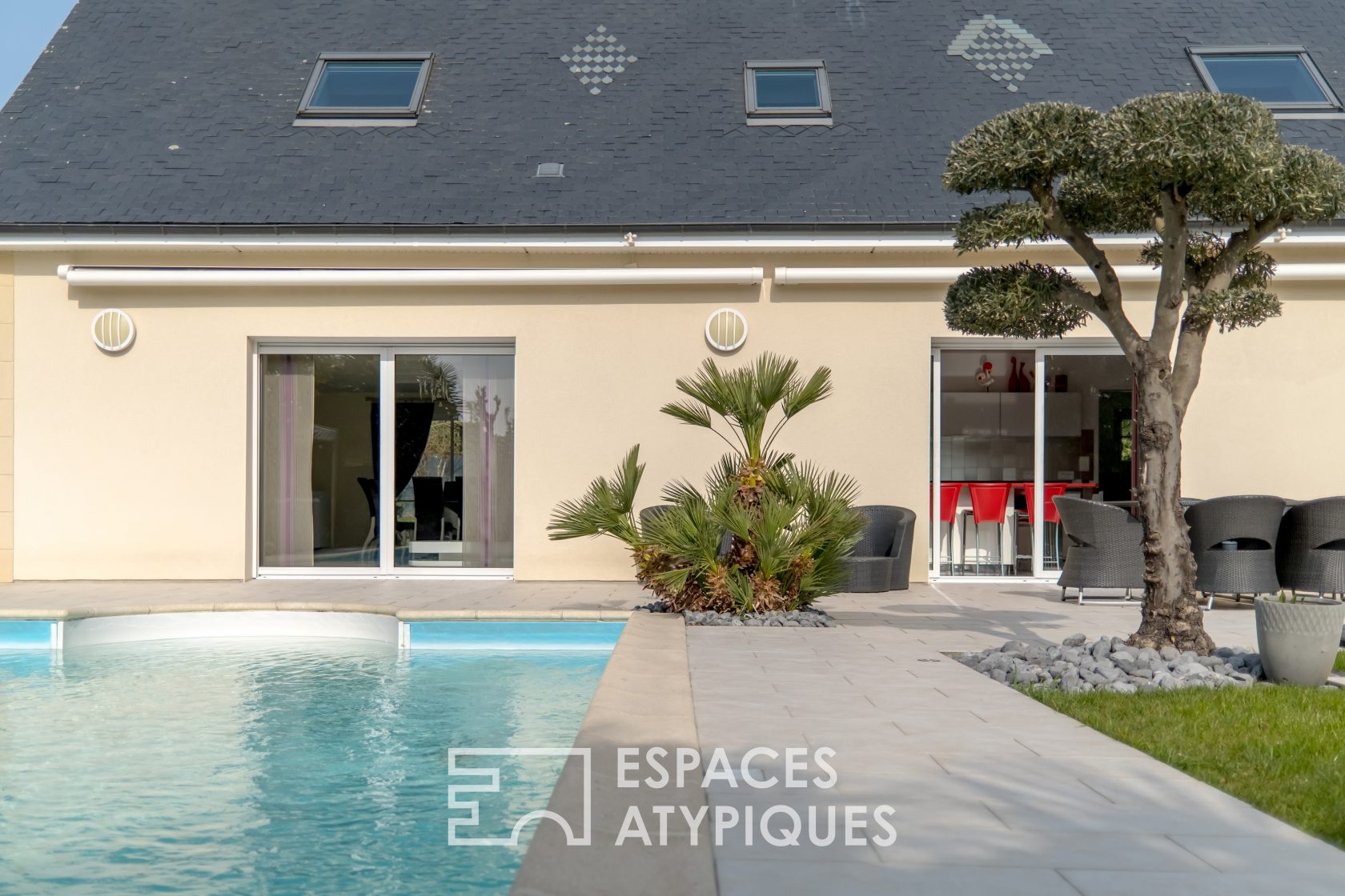 Contemporary house with swimming pool and outbuilding