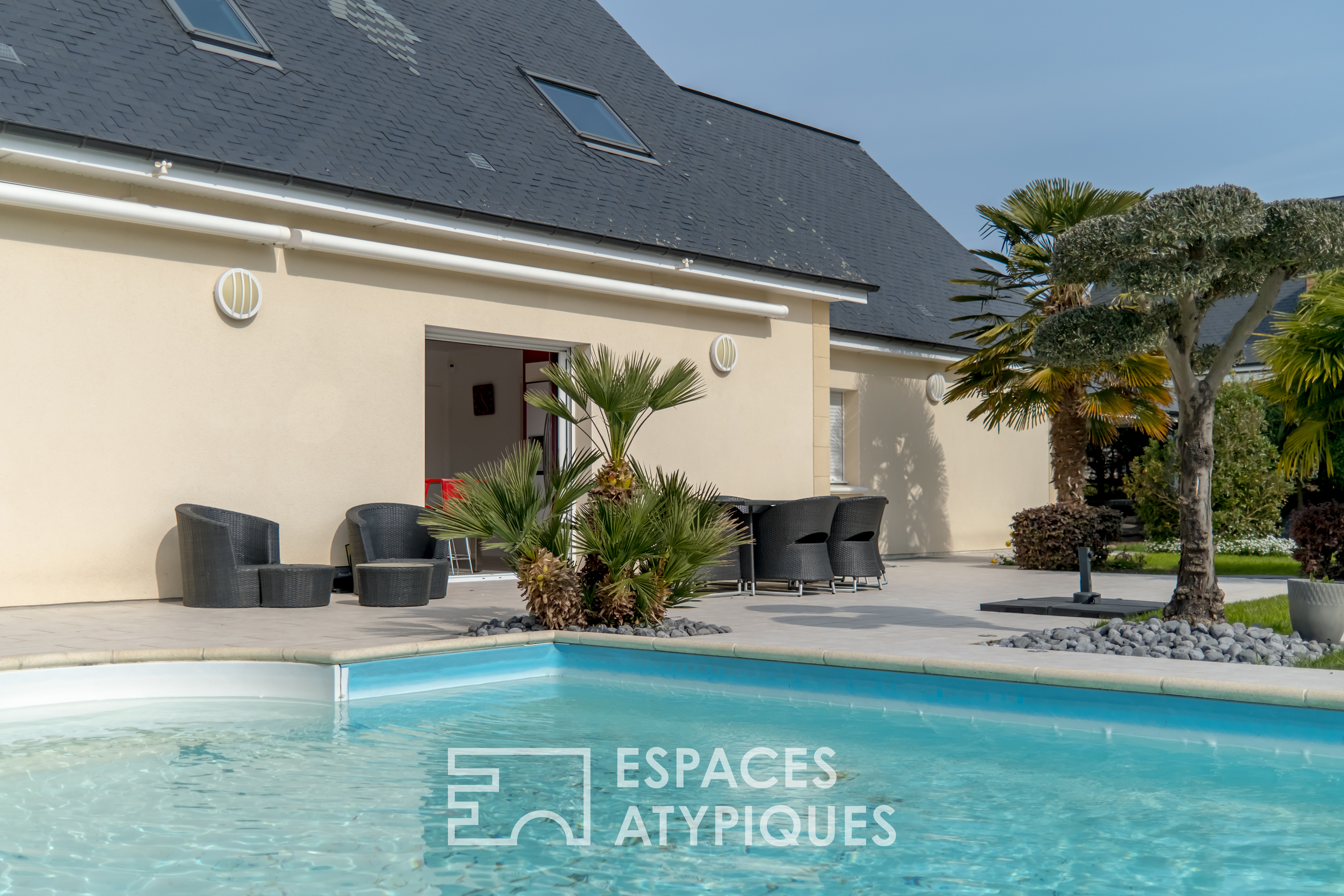 Contemporary house with swimming pool and outbuilding