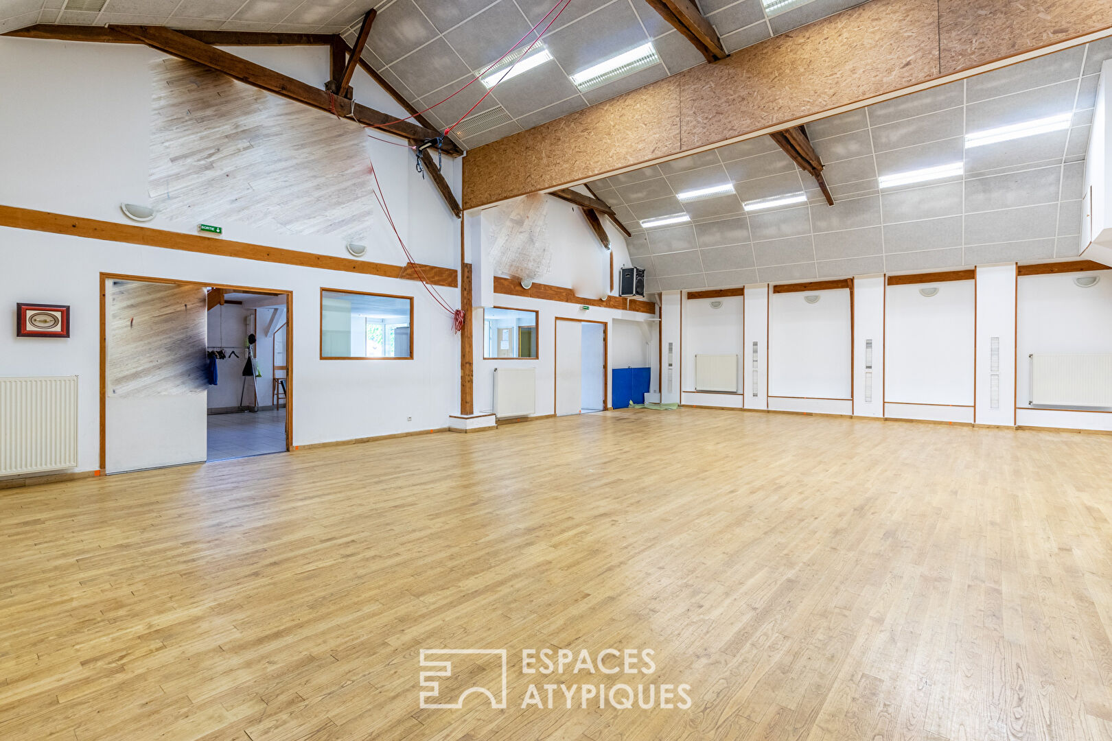 Bel atelier de 235m² aux volumes exceptionnels