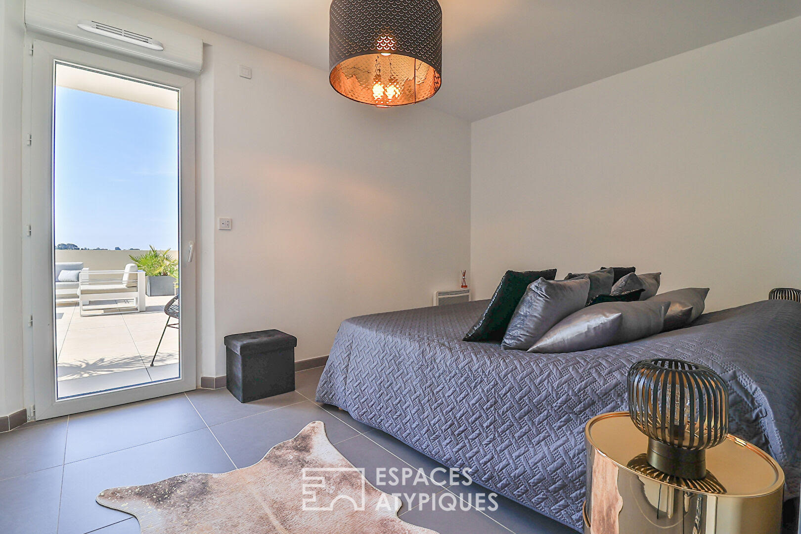 Superbe appartement en attique et sa terrasse grand volume