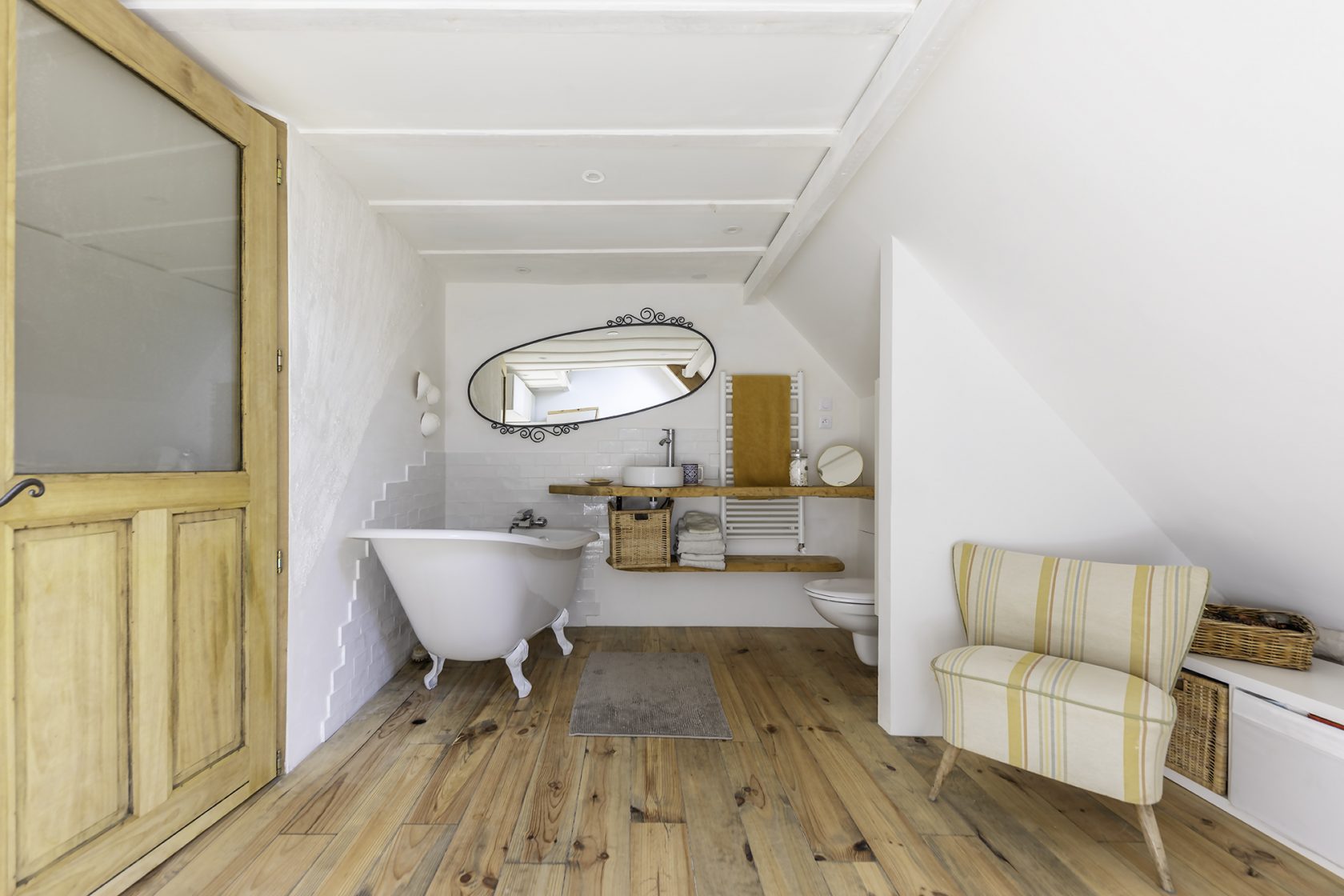 Former tack room converted into a dwelling and its three horse boxes.
