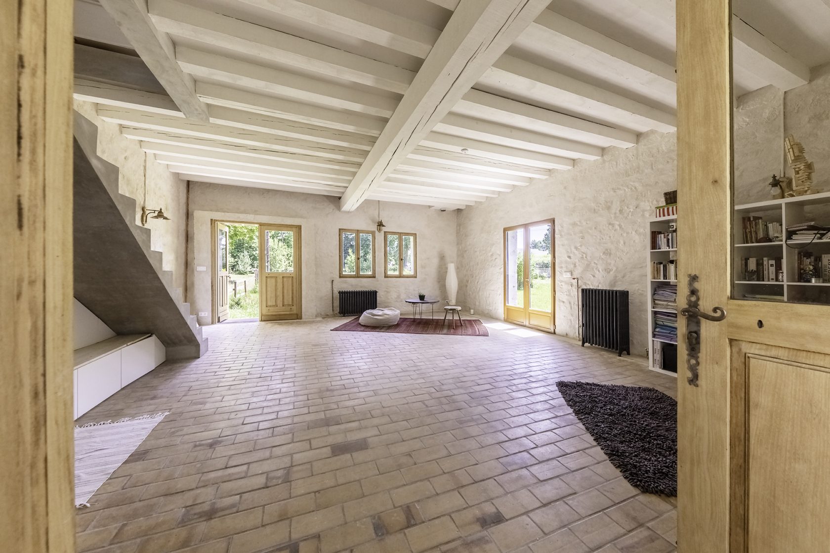 Former tack room converted into a dwelling and its three horse boxes.