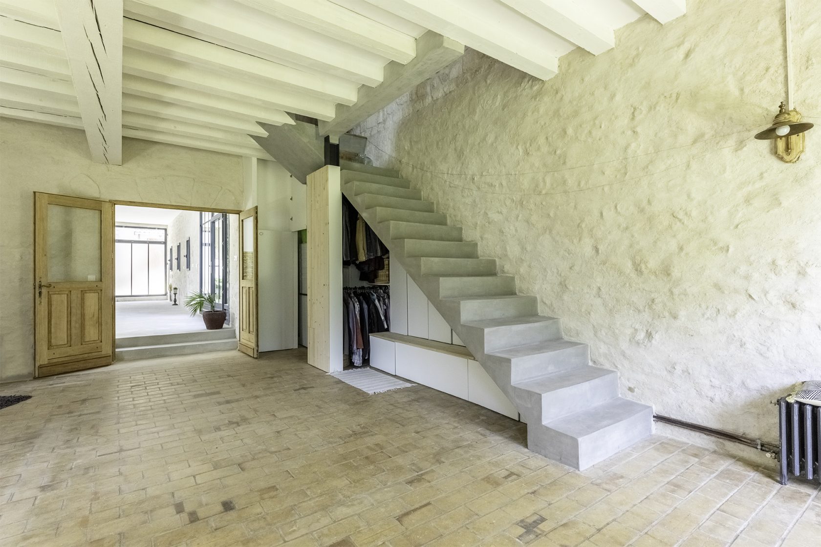 Former tack room converted into a dwelling and its three horse boxes.
