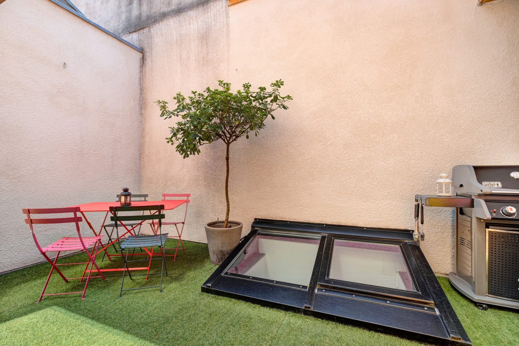 Inverted triplex with patio