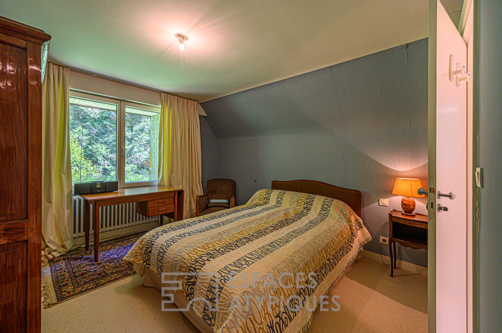 Maison familiale avec piscine au coeur d’un parc