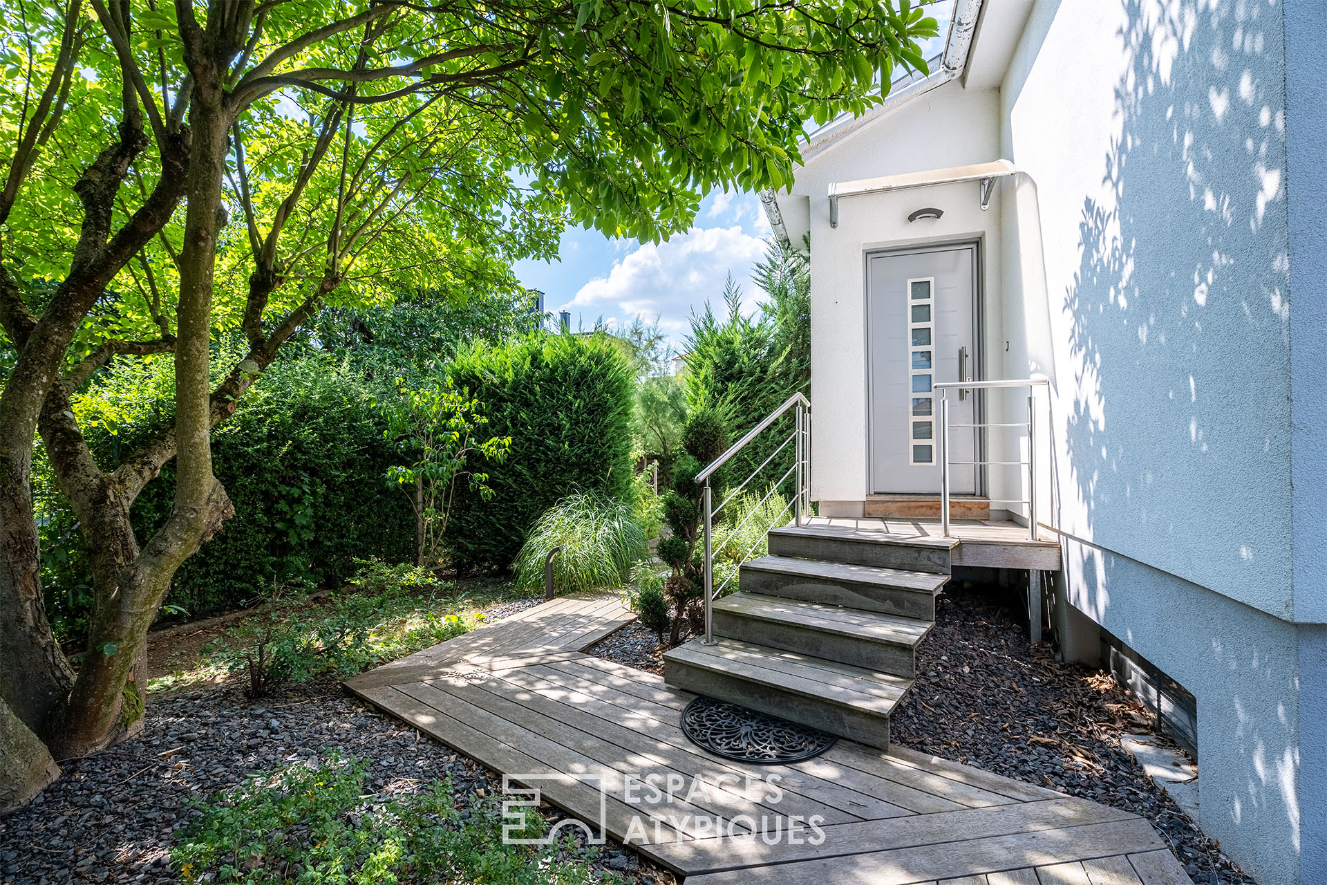 Renovated 1950s house and its garden