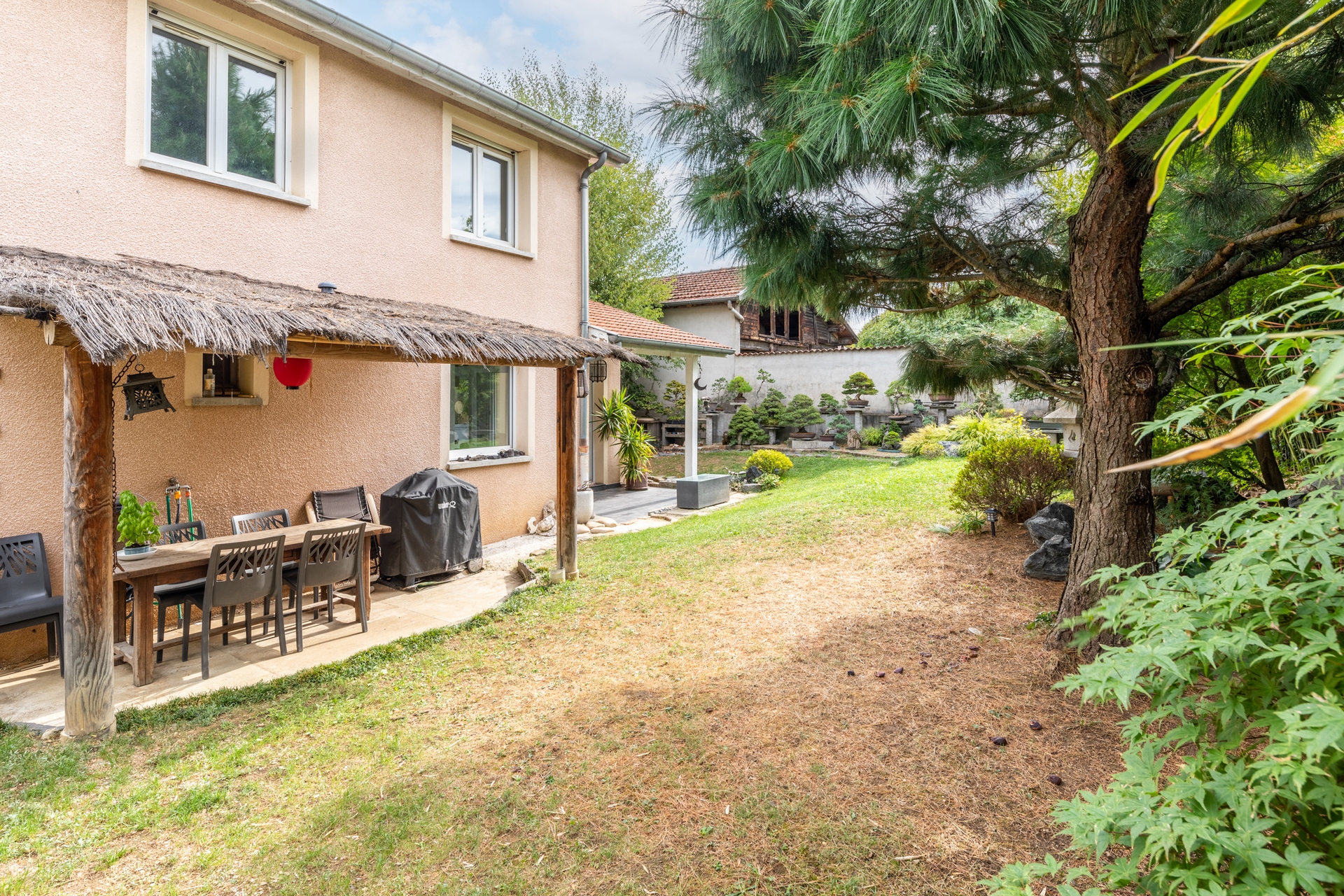 Maison et son jardin en fond d’impasse