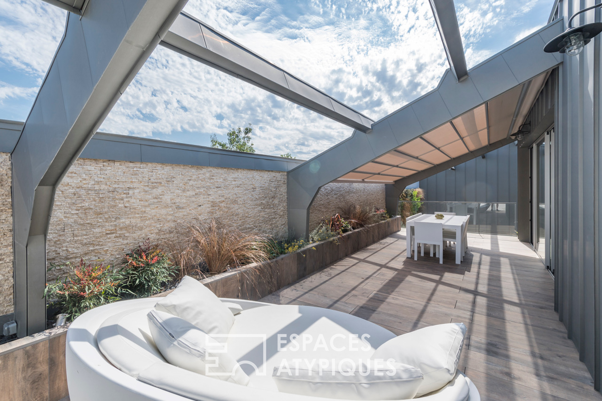 Magnifique loft avec terrasse et ses deux locatifs