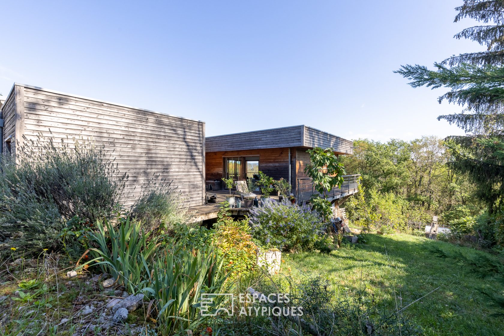 La maison en ossature bois en pleine harmonie avec la nature