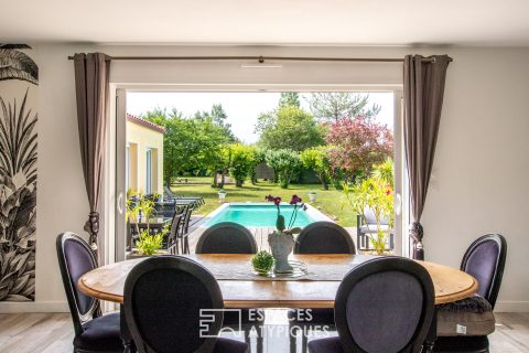 Single storey property between land and sea with pool