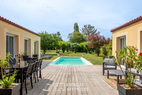 Single storey property between land and sea with pool