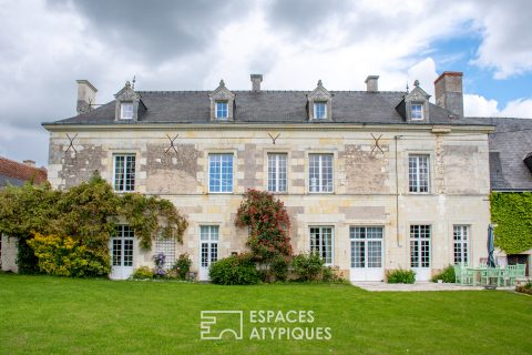 Manoir du XVème siècle en coeur de bourg avec dépendances