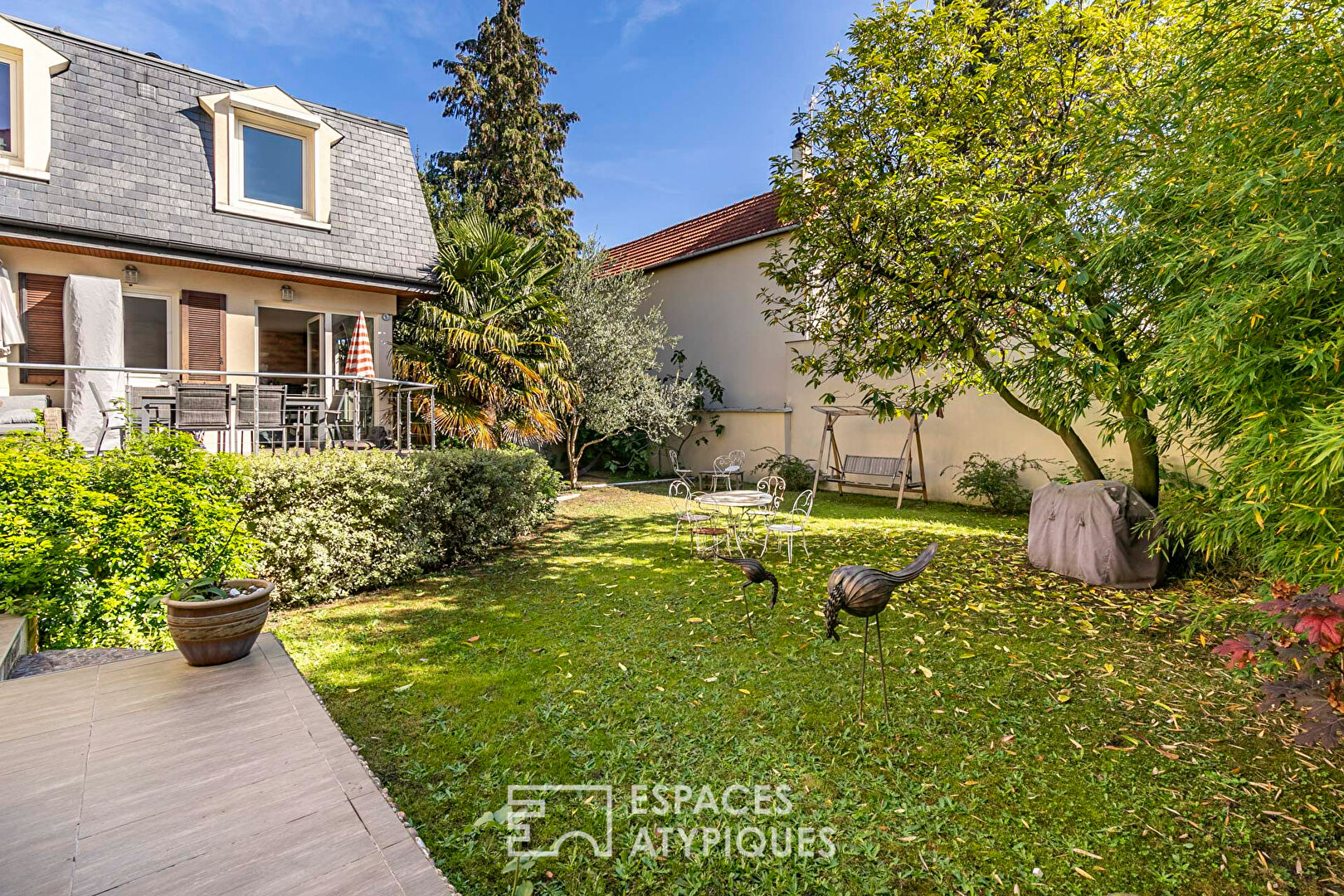 Maison avec jardin, terrasses et toit-terrasse