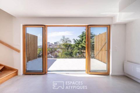 Eco-responsible apartment on the top floor with two terraces