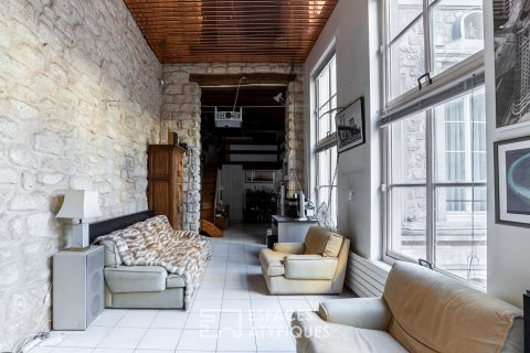 Duplex à réinventer dans un ancien hôtel particulier