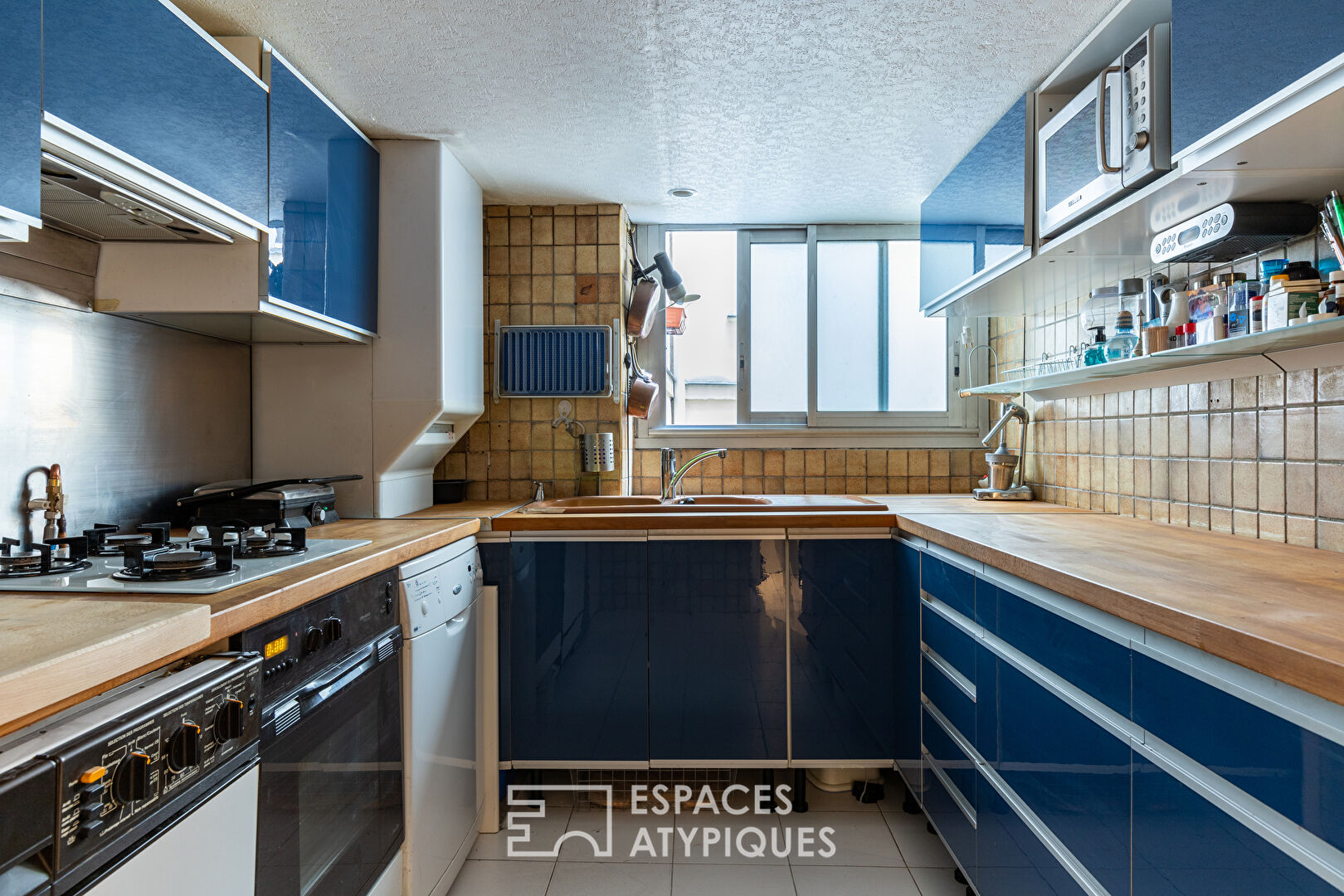 Duplex à réinventer dans un ancien hôtel particulier