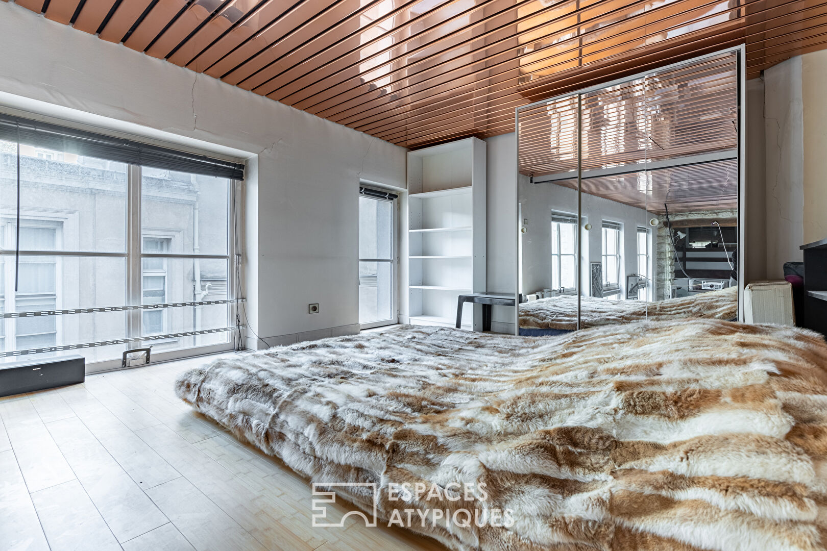 Duplex à réinventer dans un ancien hôtel particulier