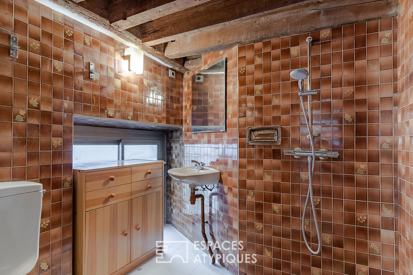 Duplex à réinventer dans un ancien hôtel particulier