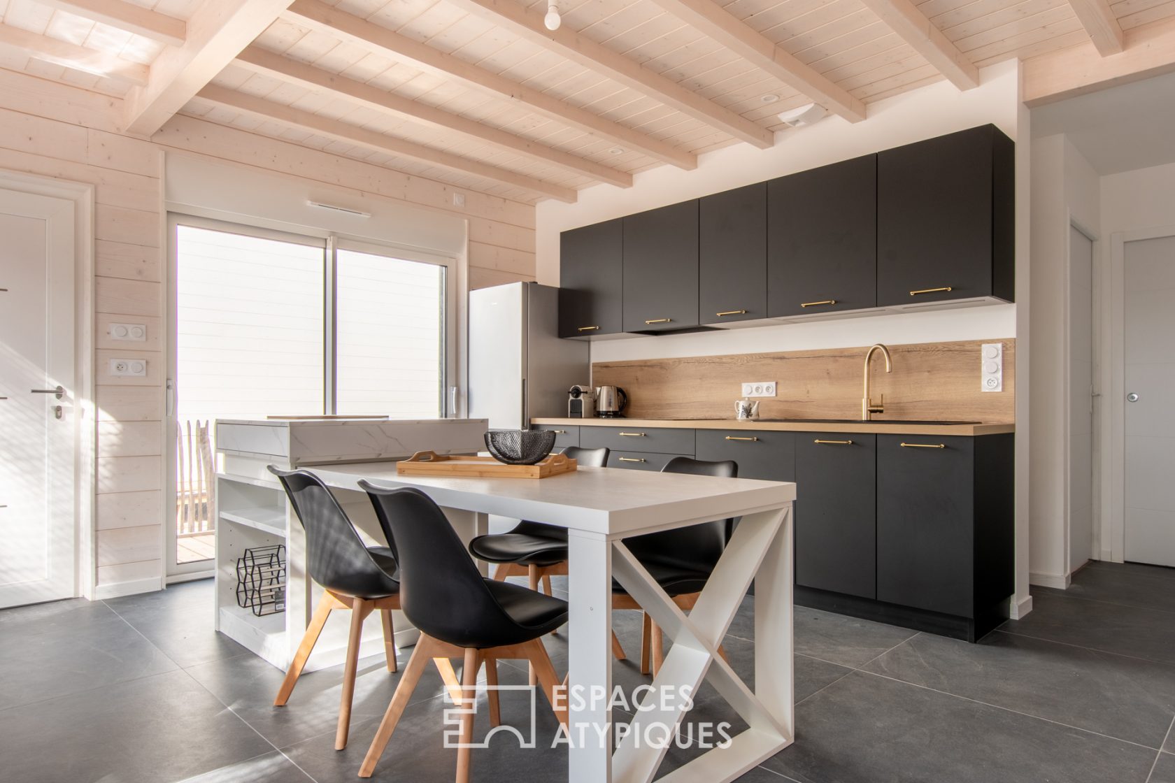 Contemporary wooden house on the front line of the coast