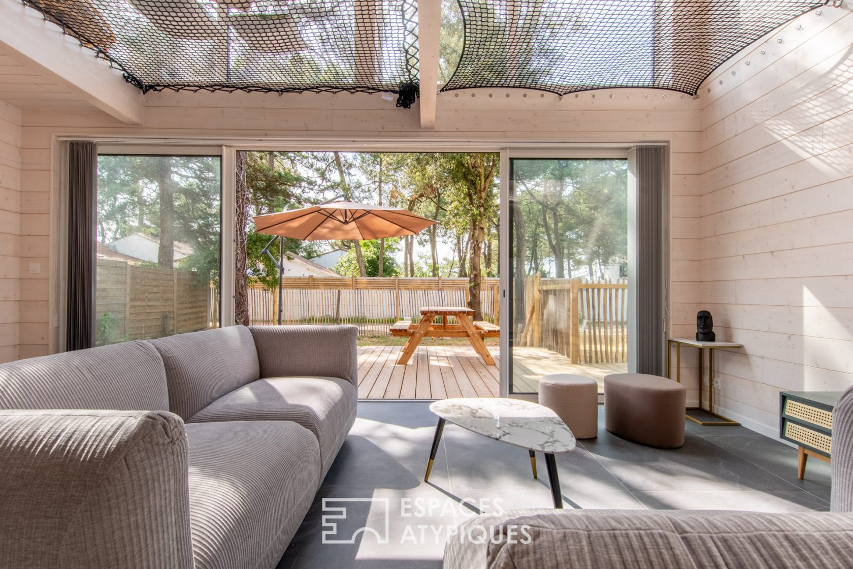 Contemporary wooden house on the front line of the coast