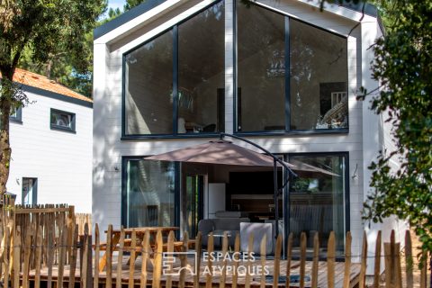 Contemporary wooden house on the front line of the coast