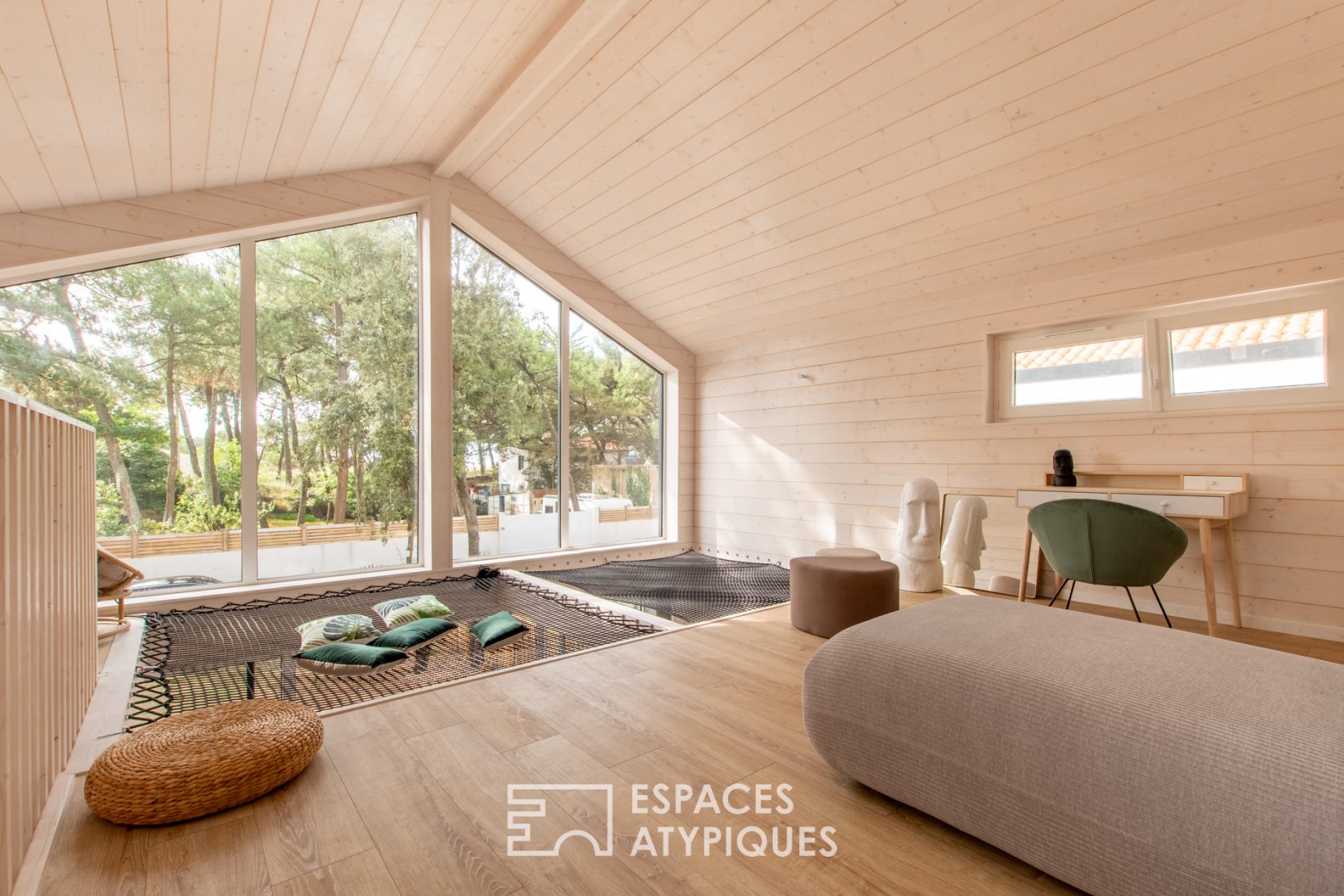 Contemporary wooden house on the front line of the coast