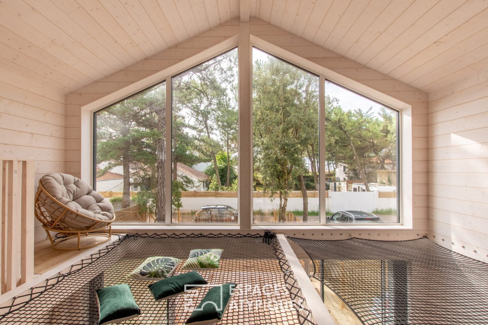 Contemporary wooden house on the front line of the coast