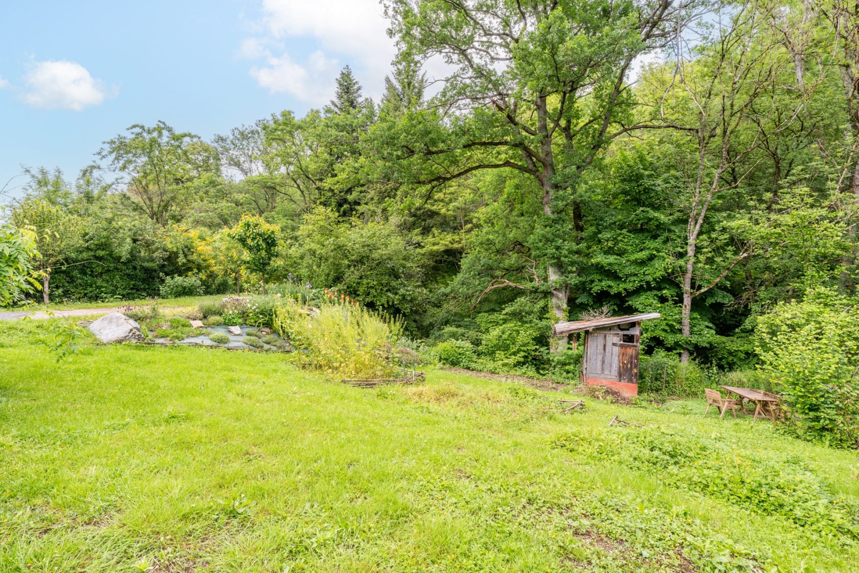 House with outbuildings and offset garden