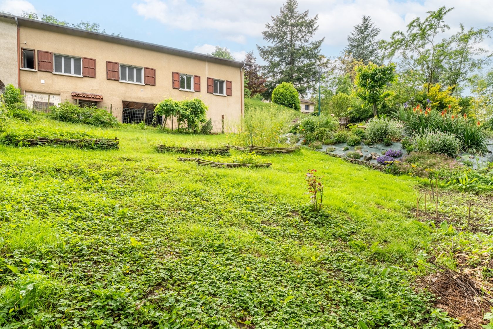 House with outbuildings and offset garden