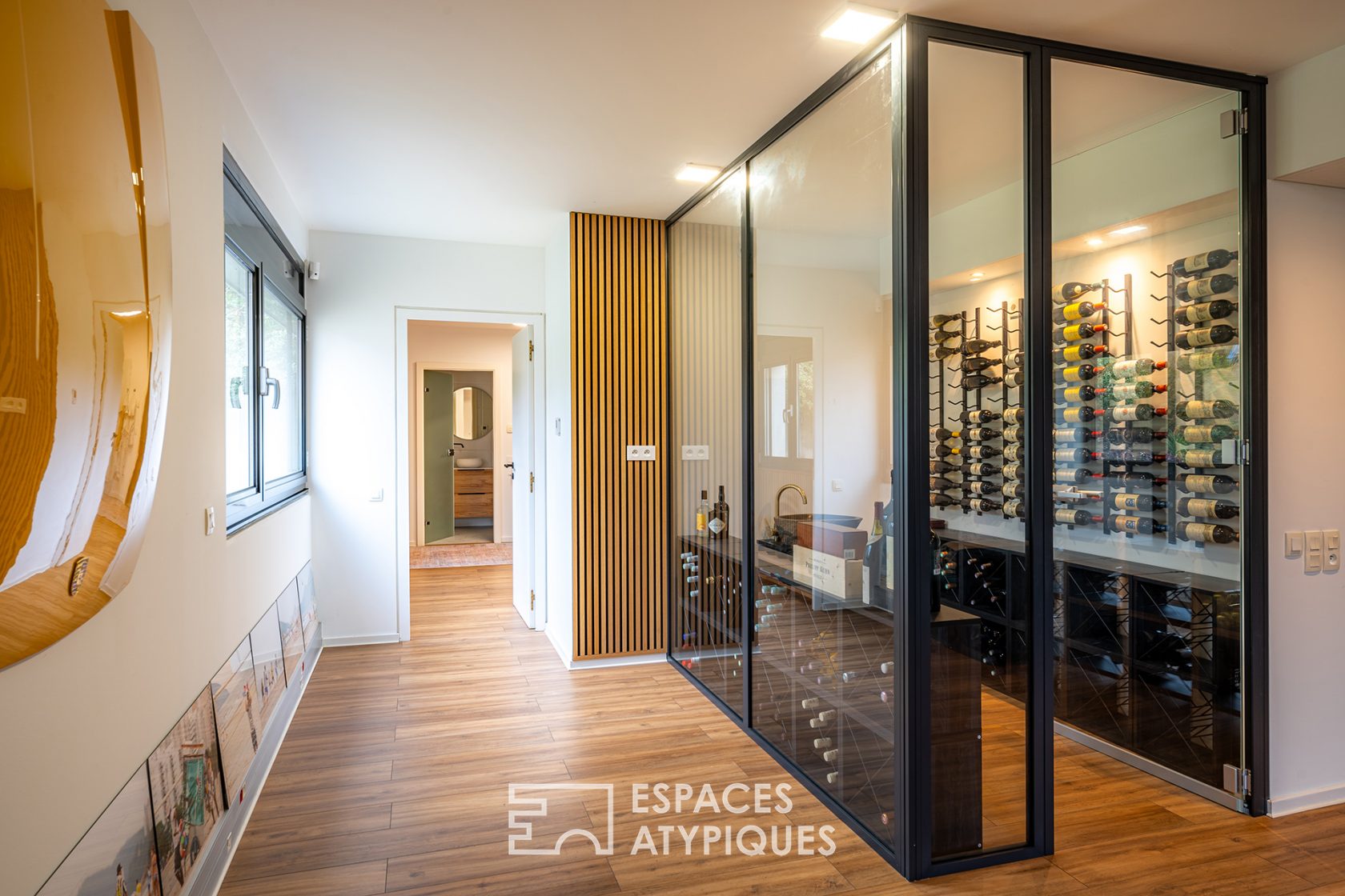 Architect-designed house with swimming pool and wooded garden