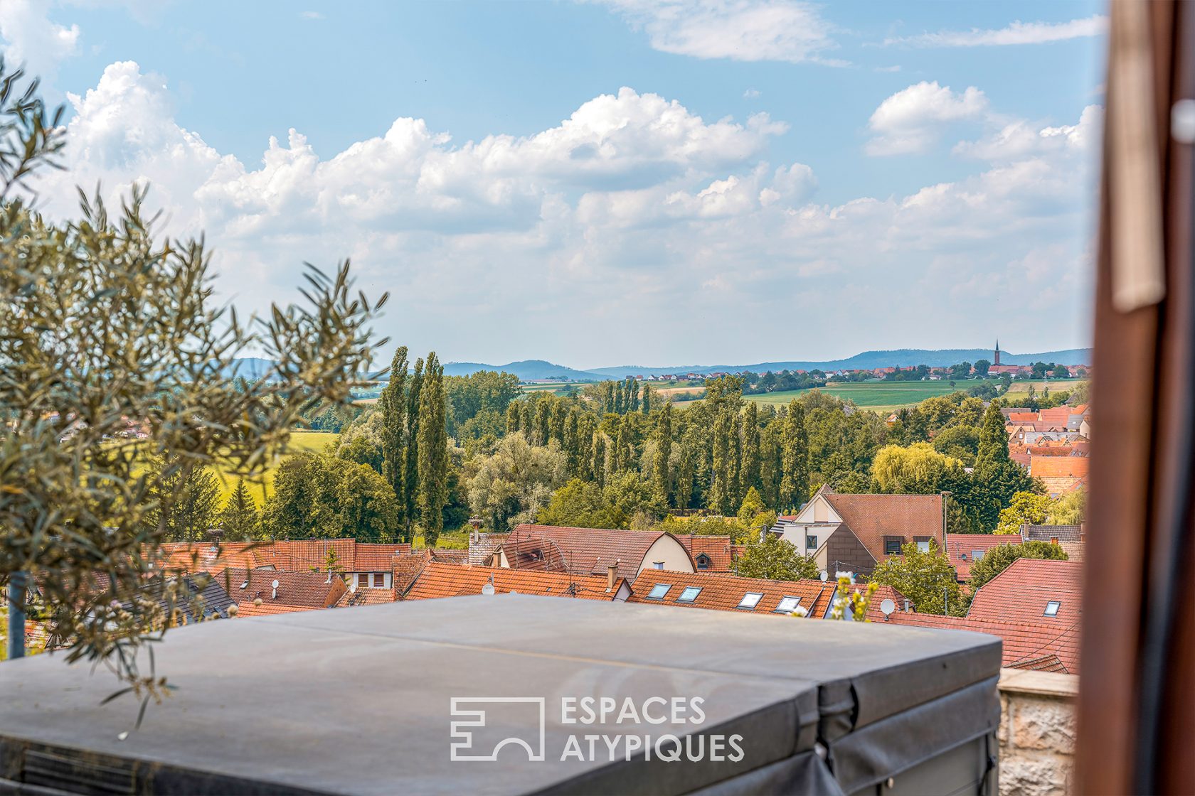 Dernier étage avec terrasse dans une ancienne brasserie