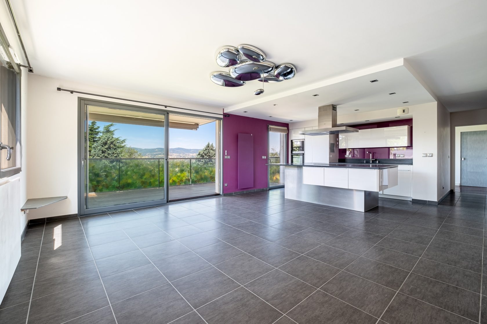 Appartement en dernier étage avec terrasse et vue sur les monts du Lyonnais