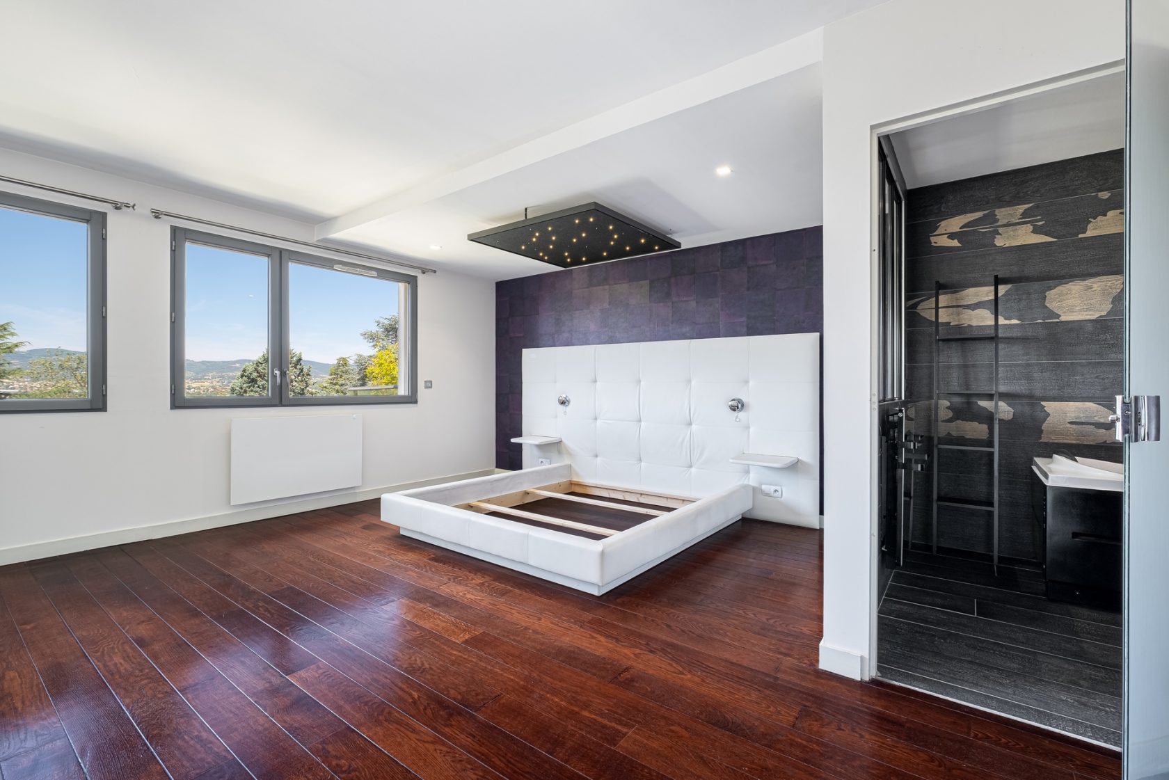 Appartement en dernier étage avec terrasse et vue sur les monts du Lyonnais